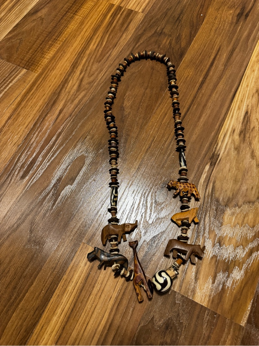 Carved Animal Pendant Bead Necklace in Warm Brown and Cream